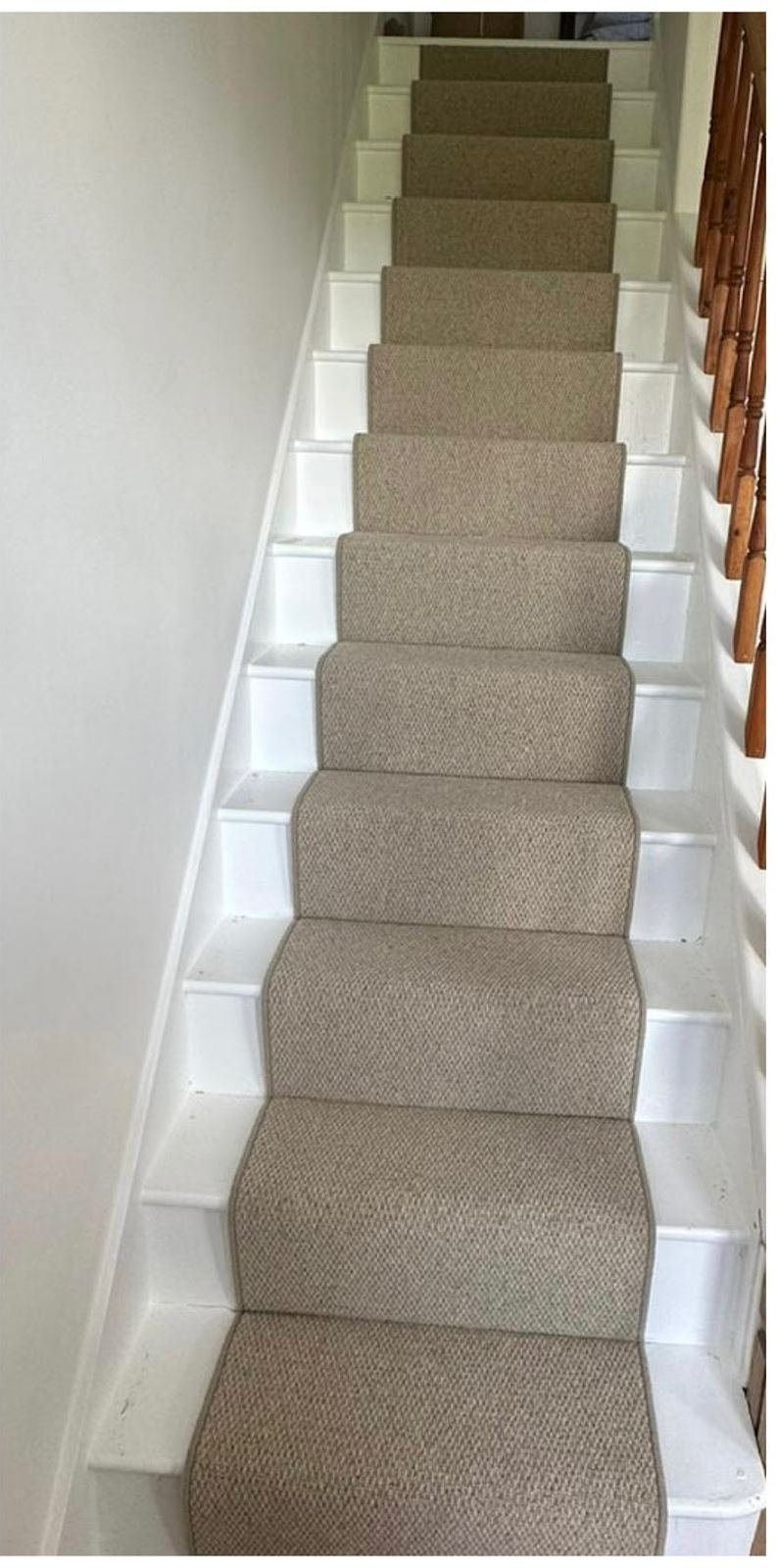 After: a natural-look runner fitted to the stairs